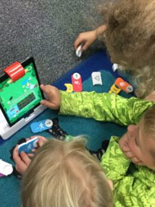 Student's Using OSMO Coding Kits